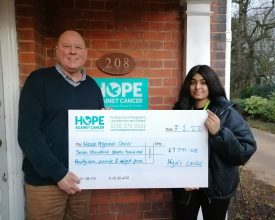 TEENAGE CANCER SURVIVOR DONATES CHEQUE TO LOCAL CHARITY
