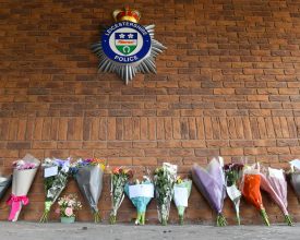 FLOWERS AND TRIBUTES FOR SIMON COLE AT LEICESTERSHIRE POLICE HEADQUARTERS