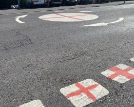 Council Urges Safety and Legality in Flag Displays and Road Markings